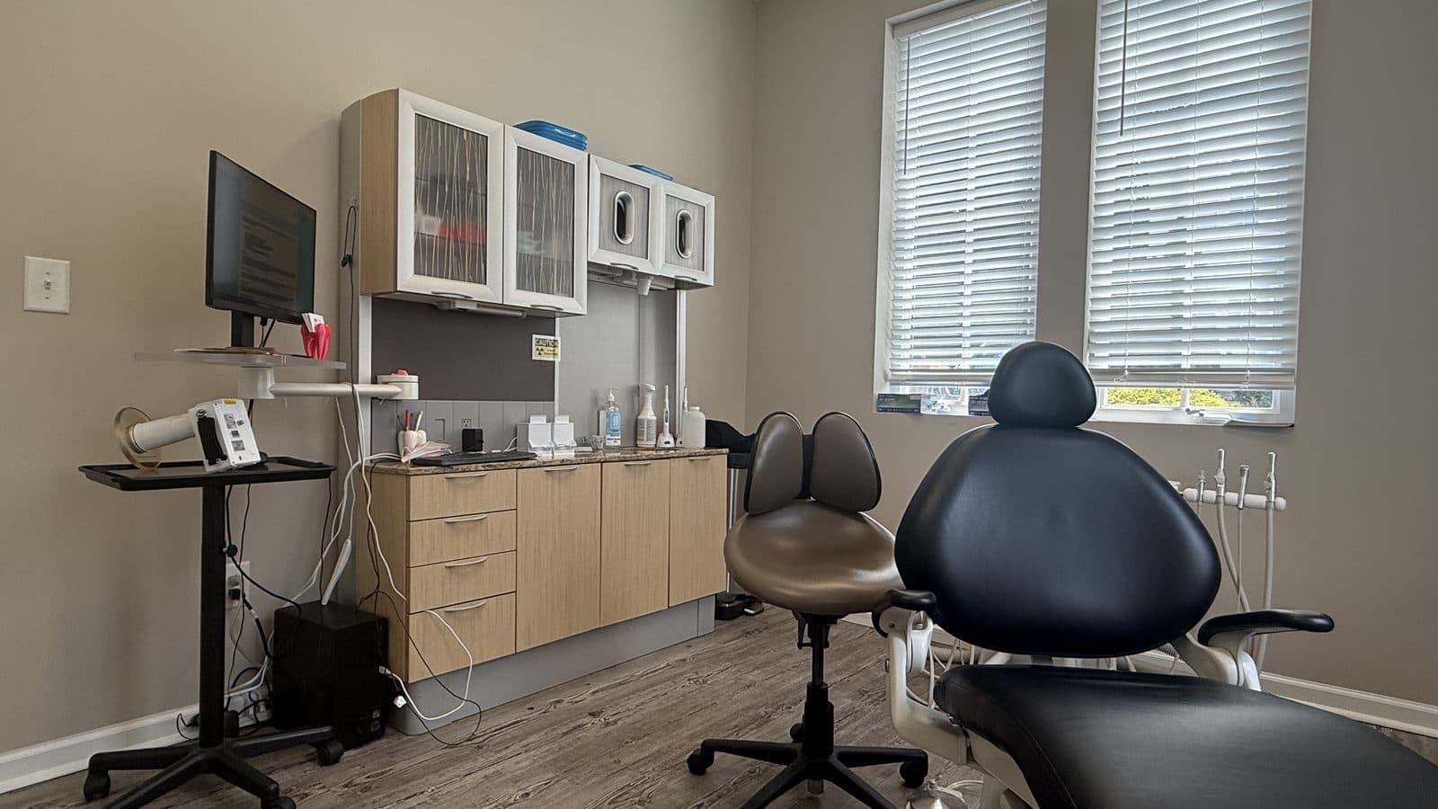 Roanoke Dental Center treatment room, warm wood tones and natural light