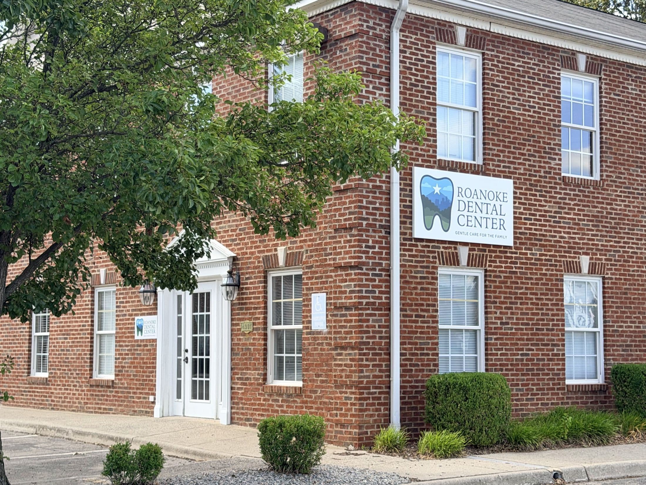 Exterior of Roanoke Dental Center - Brambleton Ave: two-story brick building at 4907 Brambleton Ave, Roanoke, VA 24018