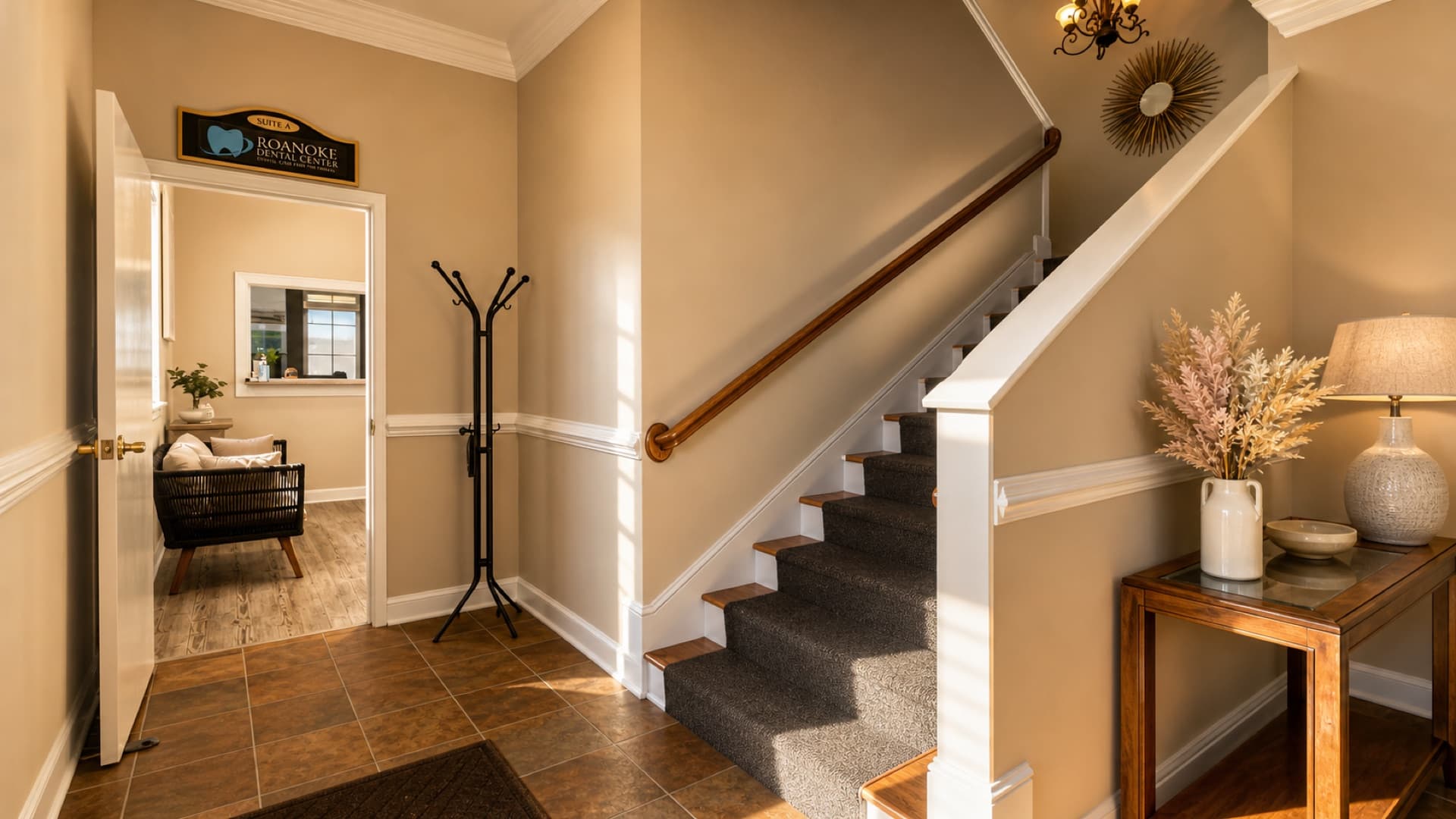 Entryway and staircase inside the Roanoke Dental Center Electric Rd office, with patient seating visible through the door